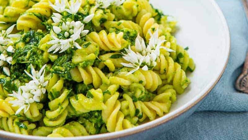 Bowl of pesto covered pasta