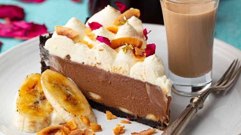 Slice of african prince pie with a shot of amarula