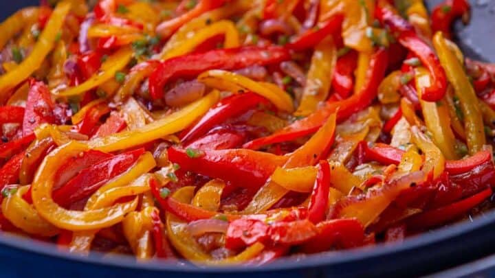 Sauteed peppers and onions in a wok