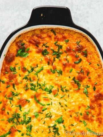 Buffalo chicken dip in a baking dish.