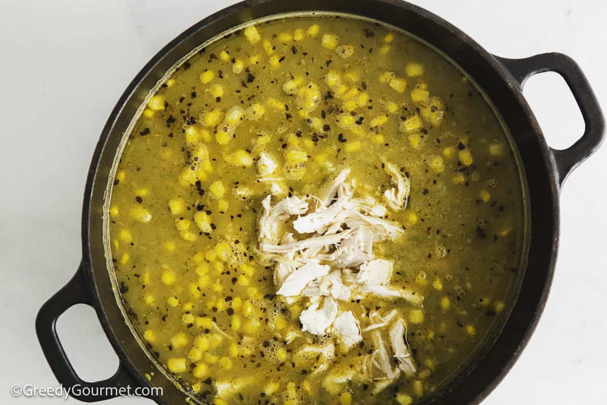 All the ingredients for white chicken chili in a pot.