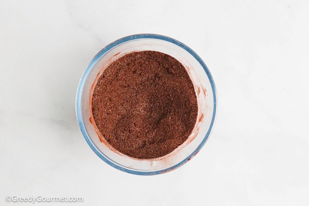 A bowl of cocoa and sugar.