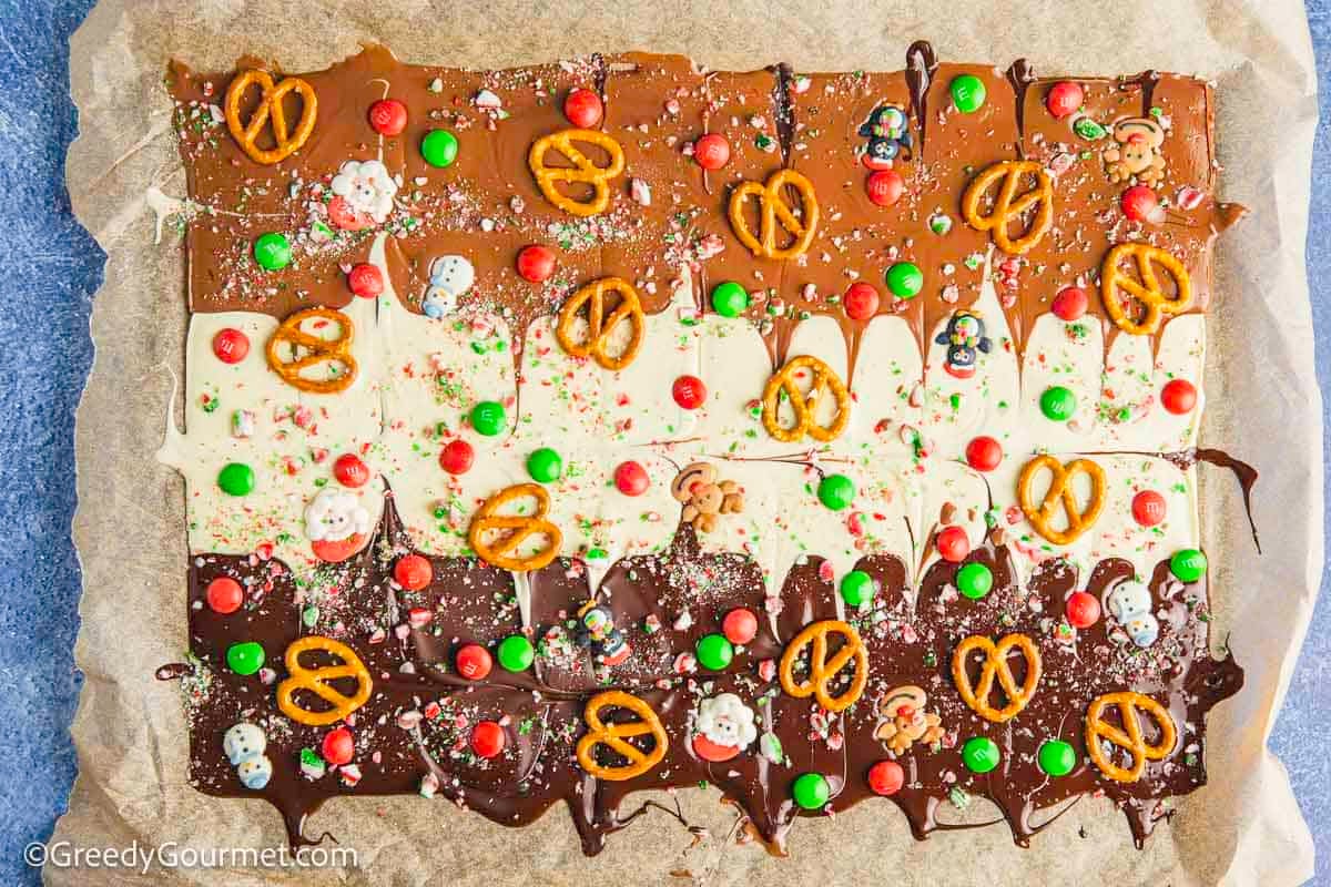 Christmas bark, melted chocolate with pretzels and candy.