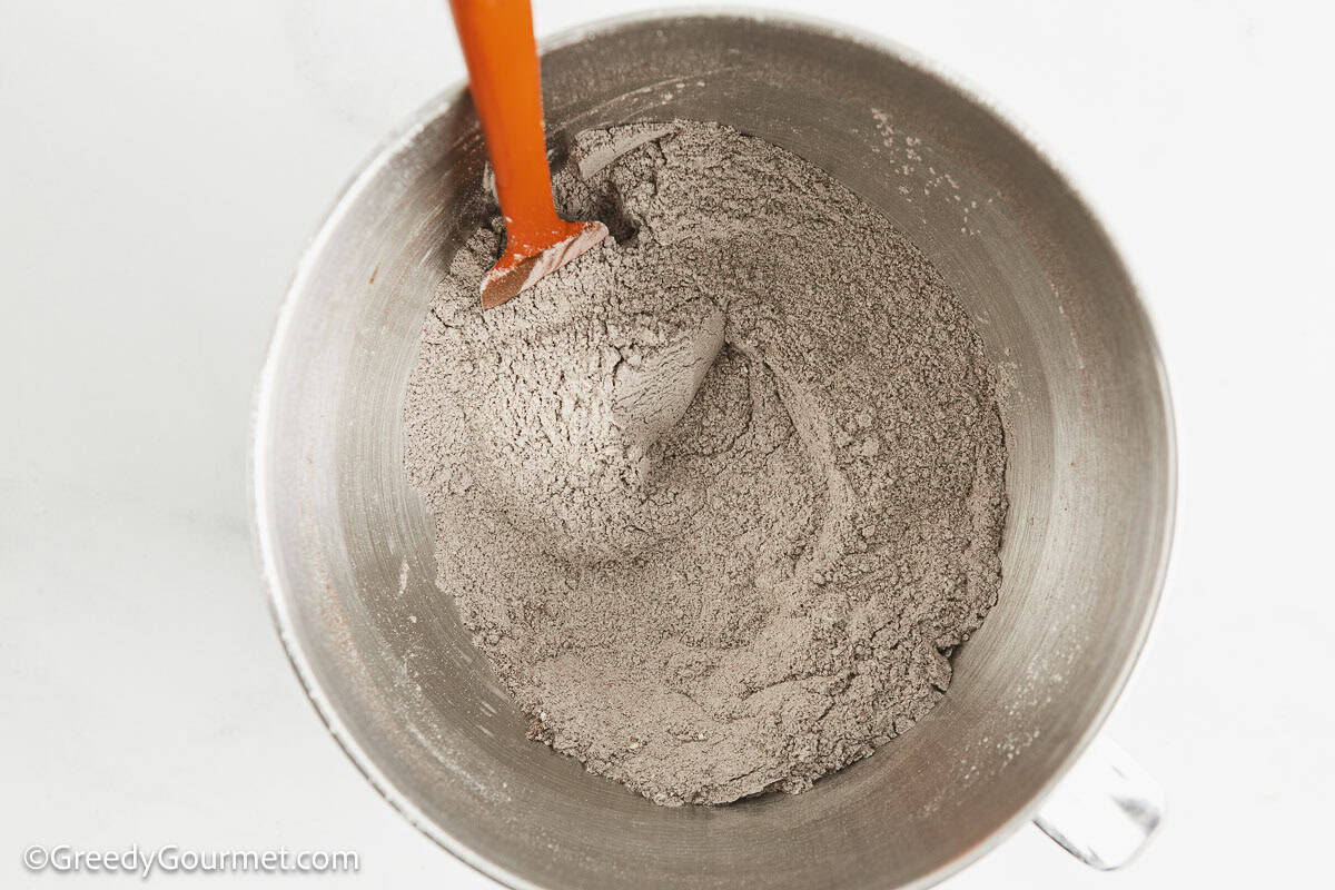 Dry ingredients for lava cake mixed in a bowl.