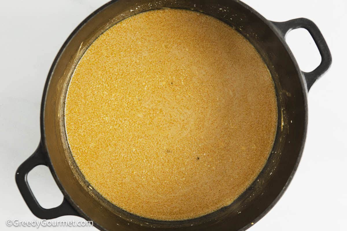 Making a cheese sauce.