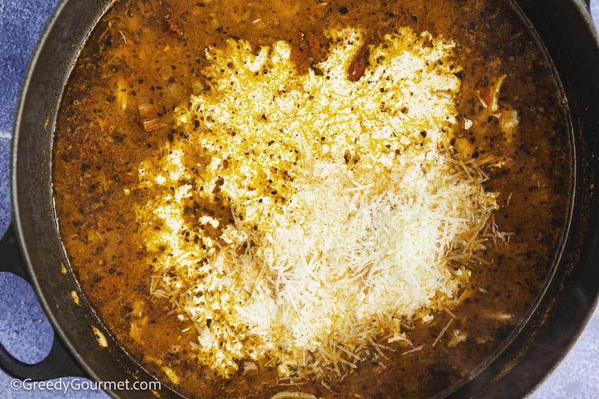 Adding cream to thicken marry me chicken soup.