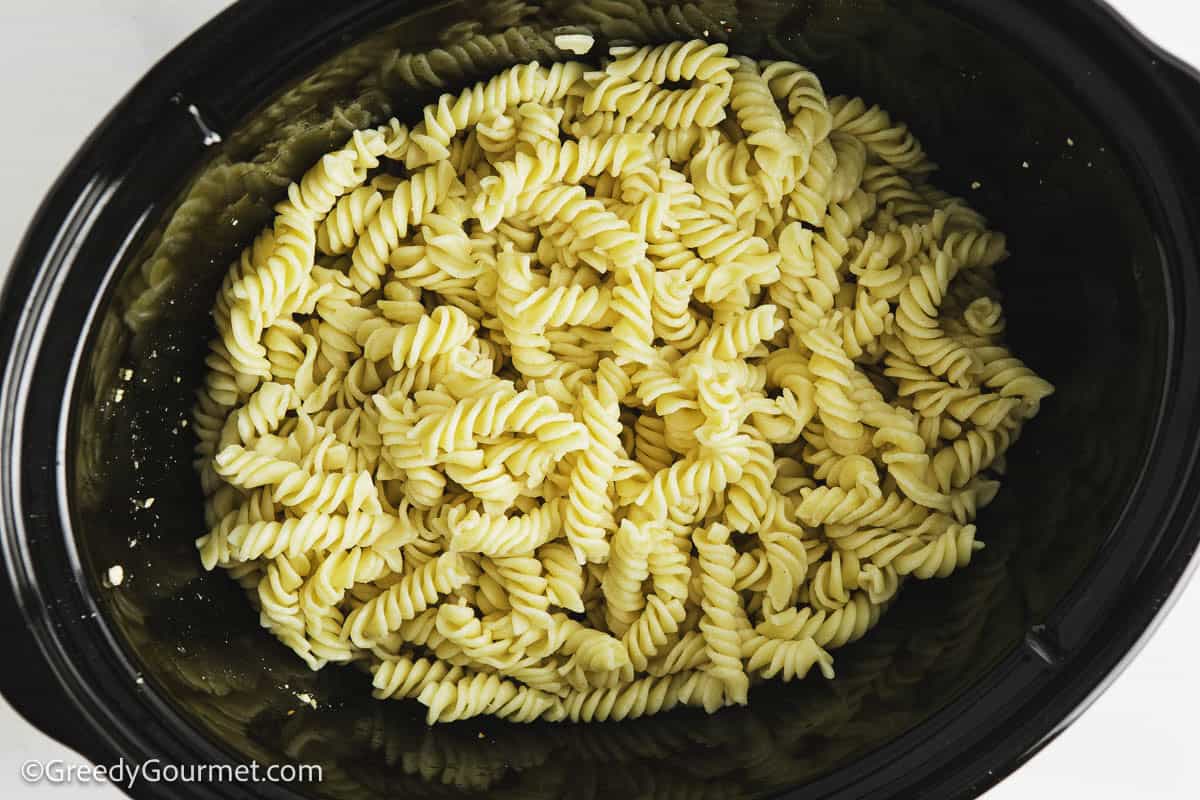 Cooked pasta in a slow cooker.