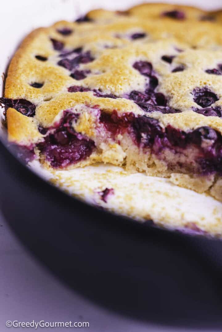 Blueberry cobbler in a casserole dish.