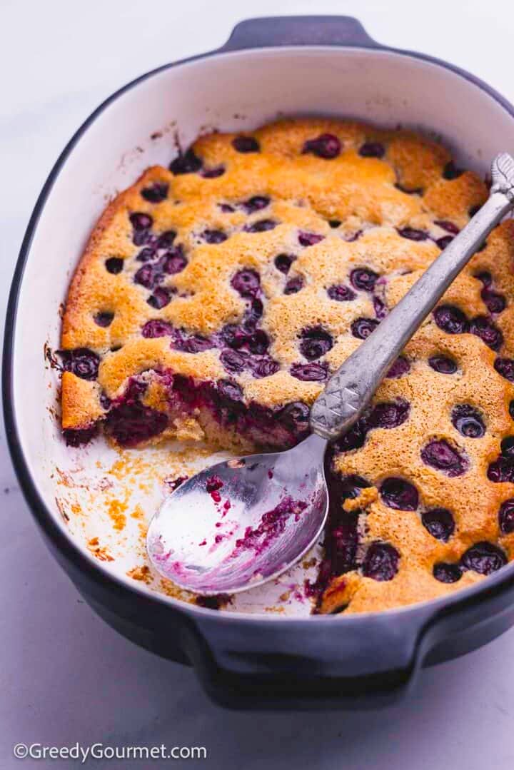 Blueberry cobbler in a casserole dish.