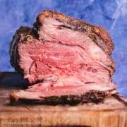 Standing Rib Roast on a wooden board.